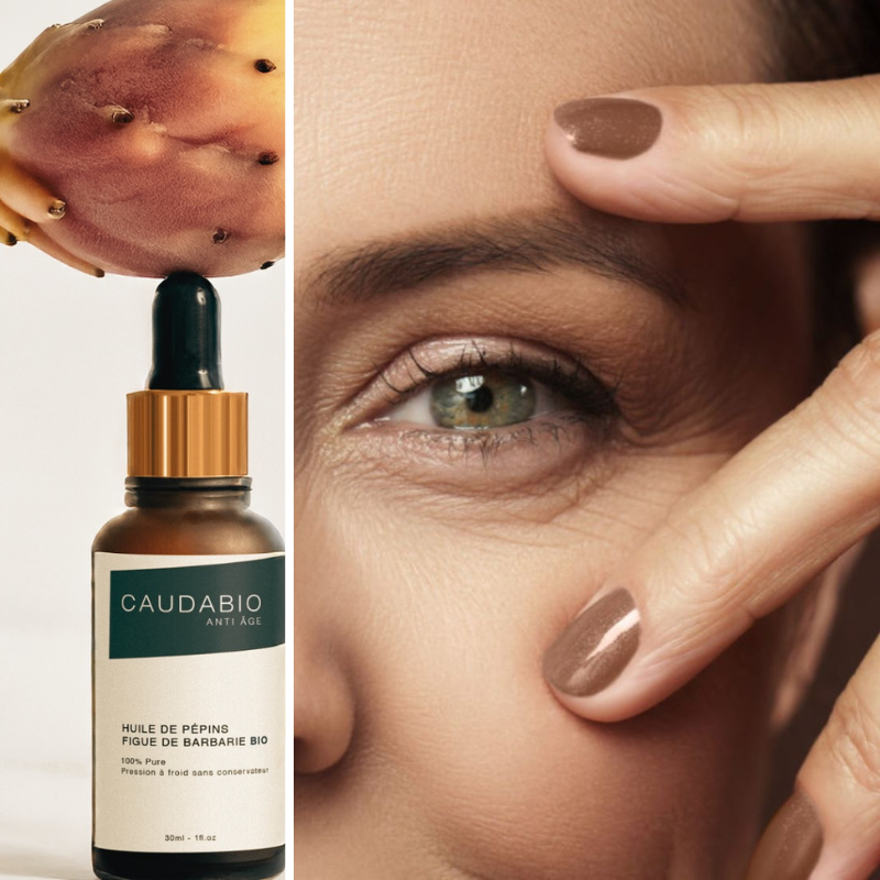 Femme montrant ses rides autour des yeux avec une bouteille d'huile de figue de barbarie Caudabio, solution naturelle anti-âge et hydratante